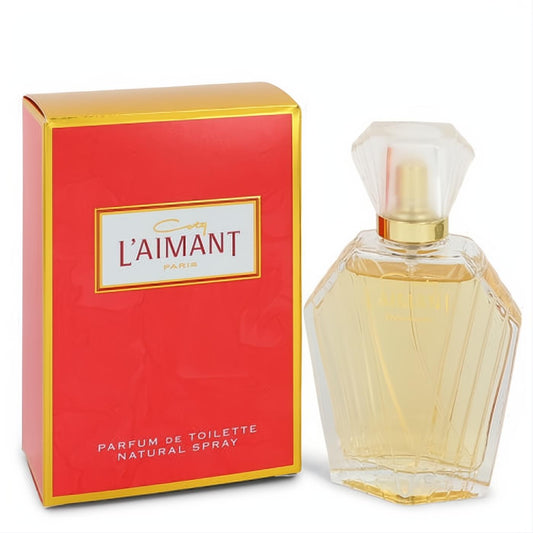 Elegant L'aimant by Coty 1.7 oz Parfum De Toilette. Vibrant red and gold box, clear faceted glass bottle with a sparkling cap.