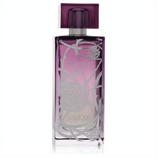 Stunning Lalique Amethyst Eclat women's perfume. Vibrant purple glass bottle with elegant silver floral vine etching and matching cap.