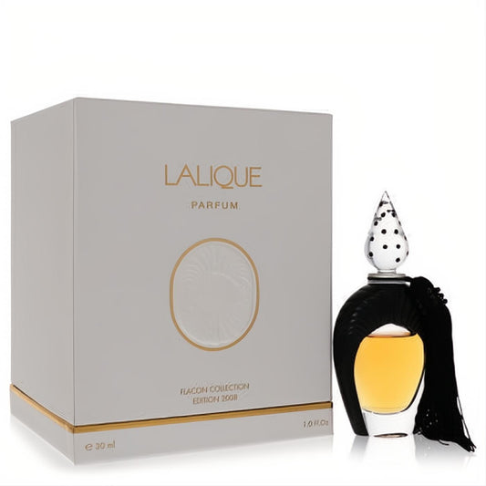Lalique Sheherazade 2008 Pure Perfume. Elegant black bottle, clear polka-dot stopper, amber liquid, and black tassel. White box, gold trim.