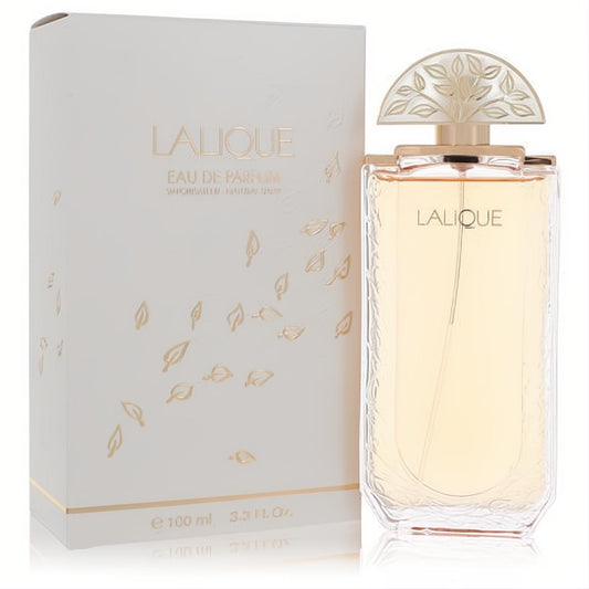 Lalique Eau De Parfum 3.3 oz spray: clear bottle with etched leaves, unique gold tree cap, and elegant white & gold leaf box.
