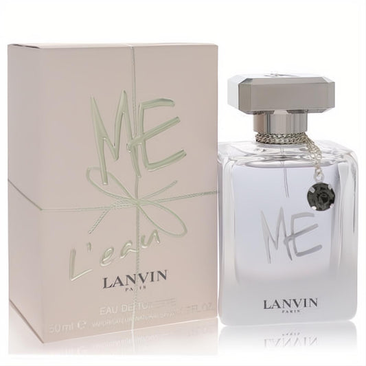 Lanvin Me L'eau women's perfume. Elegant clear glass bottle with silver cap, chain, and dark charm, next to its chic pale pink box.