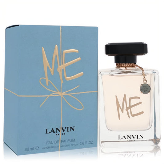 Chic Lanvin Me 2.6 oz EDP in a clear glass bottle with black cap & charm, next to a light blue box with gold 'ME' script.