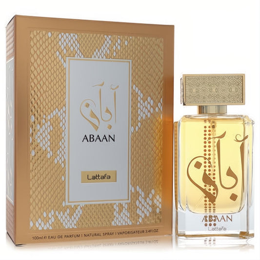 Lattafa Abaan 3.4 oz unisex EDP in a clear bottle with golden liquid, featuring elegant Arabic script, beside its luxurious gold snakeskin box.
