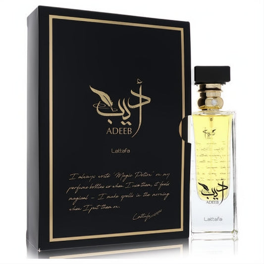 Lattafa Adeeb unisex Eau De Parfum, 2.7 oz. Exquisite black and gold box with calligraphy, alongside a clear rectangular bottle featuring a golden sprayer.