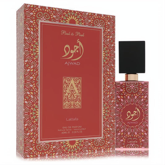 Captivating Lattafa Ajwad Pink to Pink 2 oz EDP. Ornate red/pink bottle with intricate gold Arabic script, sleek black cap, and matching patterned box.