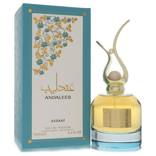Lattafa Andaleeb 3.4 oz EDP. Elegant teal box with gold floral design and a unique gold sculptural bottle cap.