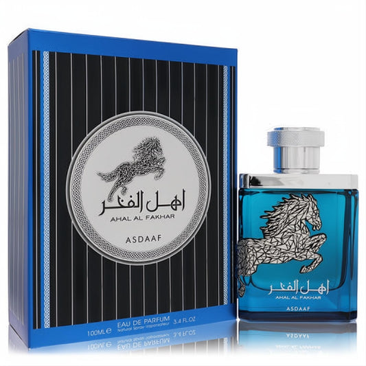 Lattafa Asdaaf Ahal Al Fakhar 3.4 oz unisex EDP. Elegant blue bottle, silver cap, and majestic horse emblem with matching striped box.