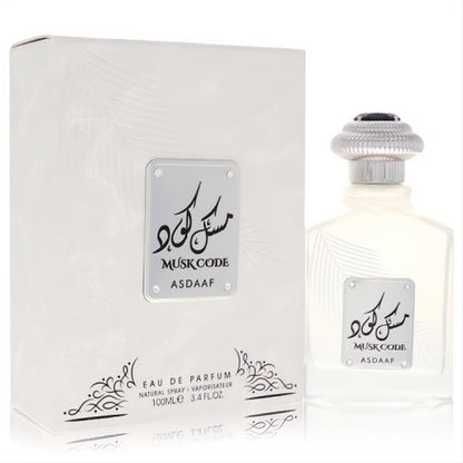 Elegant Lattafa Asdaaf Musk Code unisex EDP, 3.4 oz. Features a frosted white bottle with a sleek silver cap and matching textured white box.