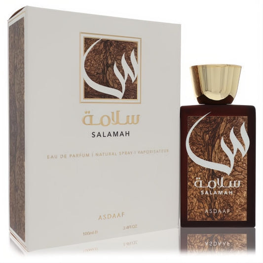 Luxurious Lattafa Asdaaf Salamah 3.4 oz unisex EDP. Dark brown glass bottle, gold cap, white box with elegant Arabic script.