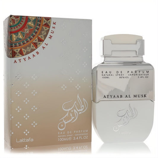 Sleek silver Lattafa Atyaab Al Musk 3.4 oz unisex EDP bottle with metallic cap and ornate white box with colorful design.