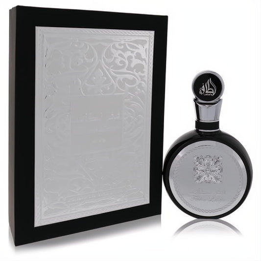 Lattafa Fakhar Eau De Parfum: Distinctive black round bottle with silver cap, ornate label, and luxurious embossed black & silver box.