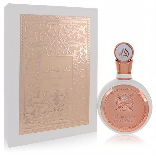 Luxurious Lattafa Fakhar women's EDP: white round bottle with rose gold ornate details and elegant embossed matching box.