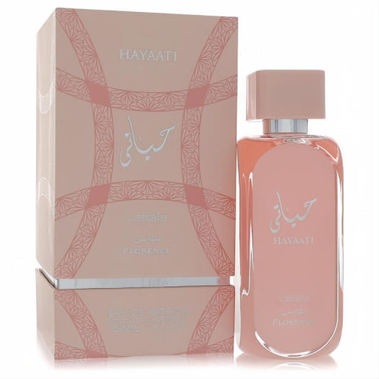 Lattafa Hayaati Florence 3.4 oz unisex Eau De Parfum. Elegant soft pink bottle with silver details and a matching patterned box.
