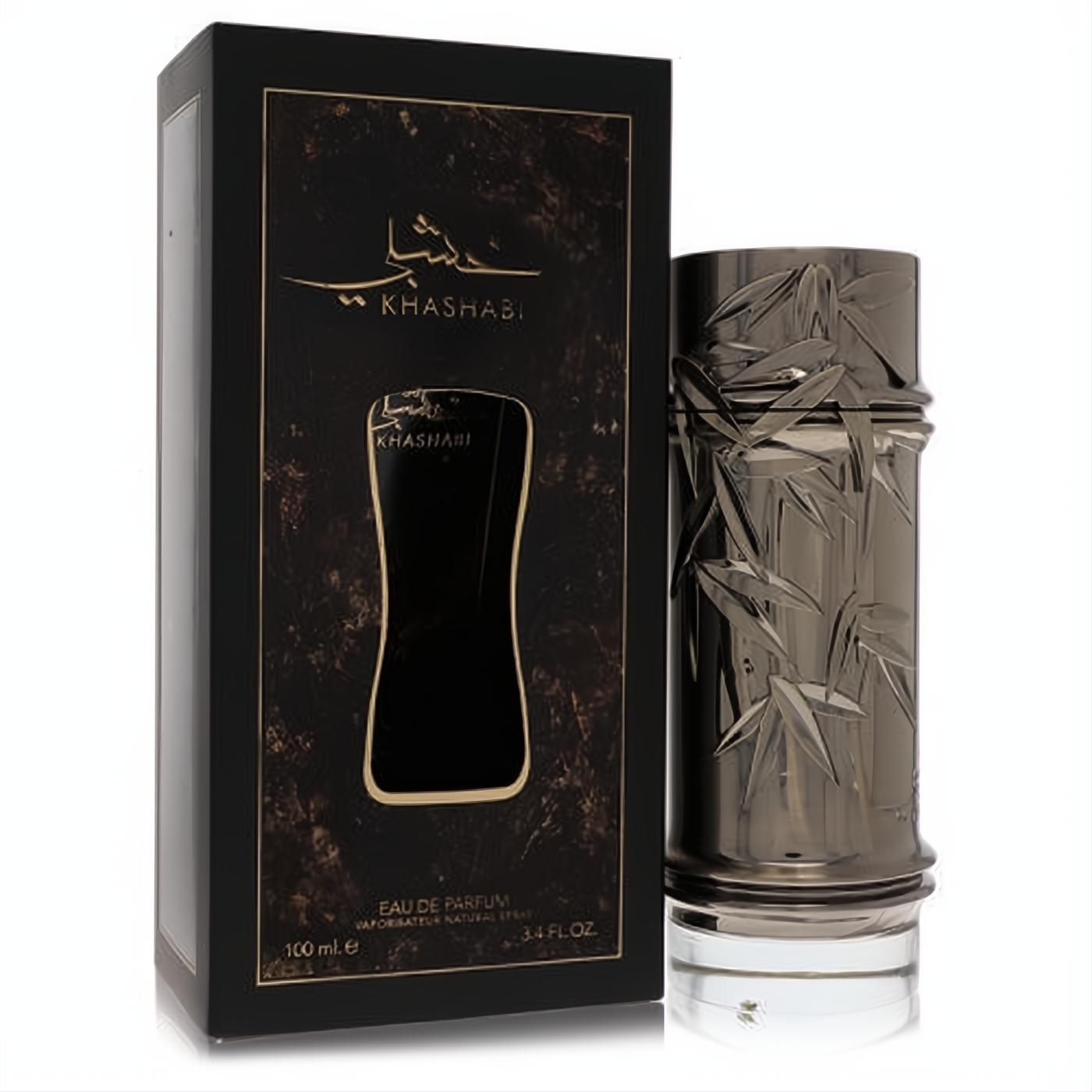 Luxurious Lattafa Khashabi unisex 3.4 oz EDP. Dark metallic bottle with elegant bamboo leaf design, presented with its sleek black and gold box.