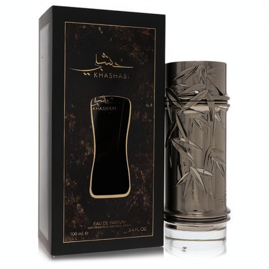 Luxurious Lattafa Khashabi unisex 3.4 oz EDP. Dark metallic bottle with elegant bamboo leaf design, presented with its sleek black and gold box.