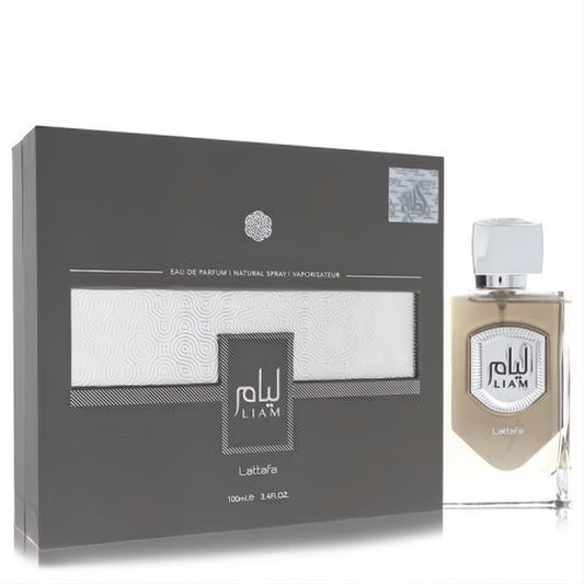 Lattafa Liam Grey 3.4 oz unisex Eau De Parfum spray. Sleek dark grey box with silver accents, clear bottle, light beige scent.