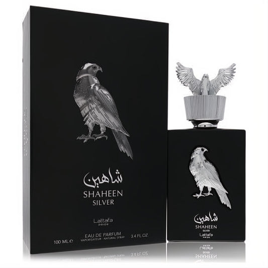 Lattafa Pride Shaheen Silver 3.4 oz unisex EDP. Elegant black bottle with a majestic silver falcon emblem and winged cap.