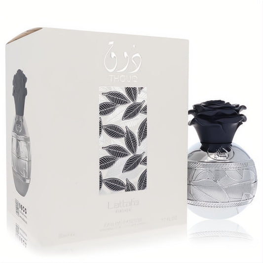 Lattafa Pride Thouq 2.7 oz unisex EDP. Elegant silver bottle with embossed leaf design, black rose cap, and matching white box.