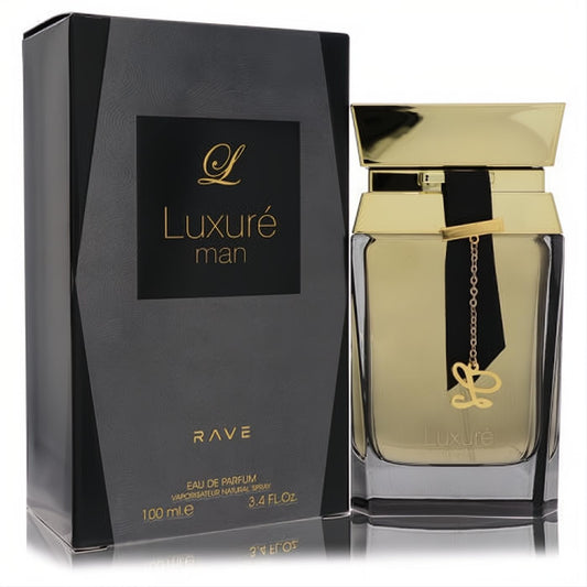 Lattafa Rave Luxure 3.4 oz men's EDP. Striking gold bottle with a black ribbon, "L" charm, and sophisticated black box.