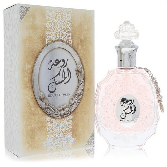 Lattafa Rouat Al Musk 3.4 oz unisex EDP. Elegant gold box & clear glass bottle with light pink fragrance, ornate silver cap, and chain.