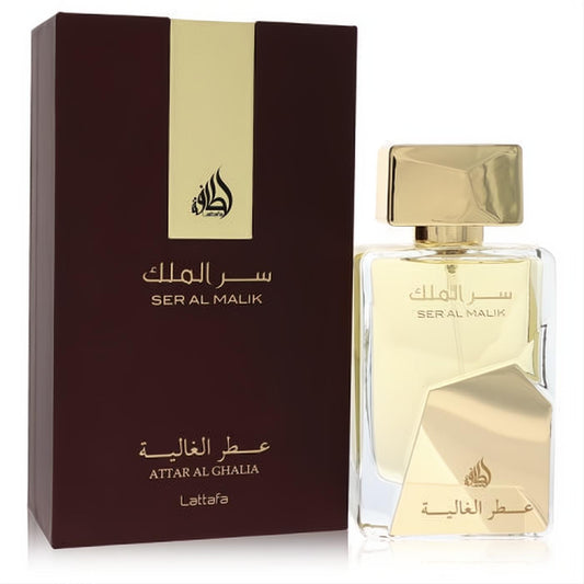 Lattafa Ser Al Malik 3.4 oz EDP. Luxurious gold-capped glass bottle with geometric design, next to its maroon and gold box.