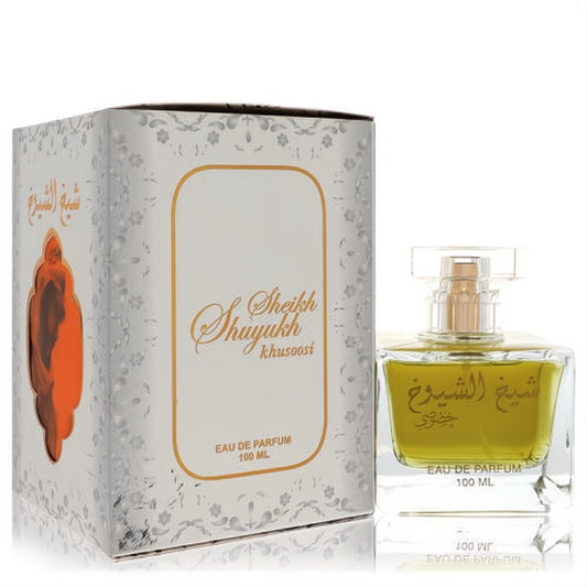 Stunning Lattafa Sheikh Al Shuyukh Khusoosi 100ml unisex EDP. Clear glass bottle with golden liquid, elegant gold script, and ornate silver box.
