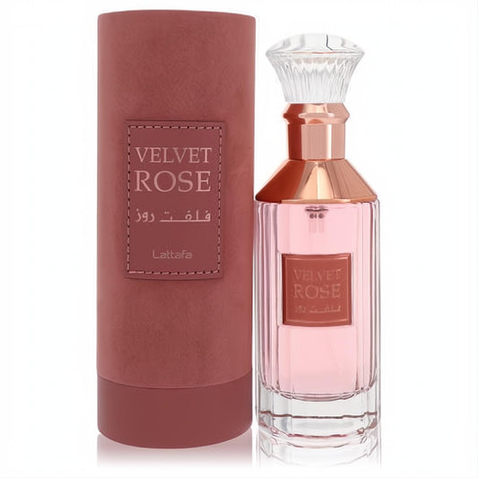 Lattafa Velvet Rose 3.4 oz unisex EDP. Elegant pink ribbed glass bottle with rose gold accents and a luxurious dusty rose velvet box.