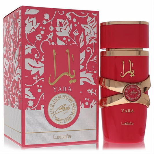 Vibrant fuchsia Lattafa Yara Candy 3.4 oz women's perfume bottle and matching box with luxurious gold accents.