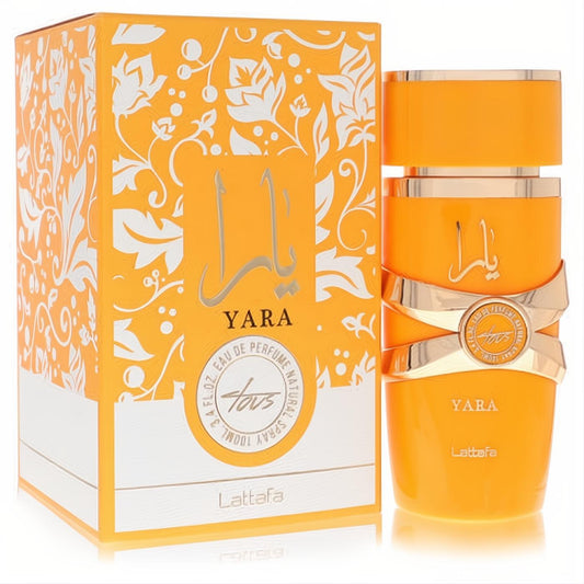 Vibrant Lattafa Yara Tous 3.4 oz EDP spray in an orange bottle with a distinctive gold ribbon and matching floral box.