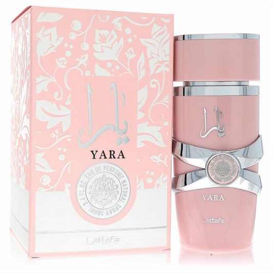 Elegant Lattafa Yara 3.4 oz pink EDP spray bottle with a chic silver bow design and a beautiful floral box.