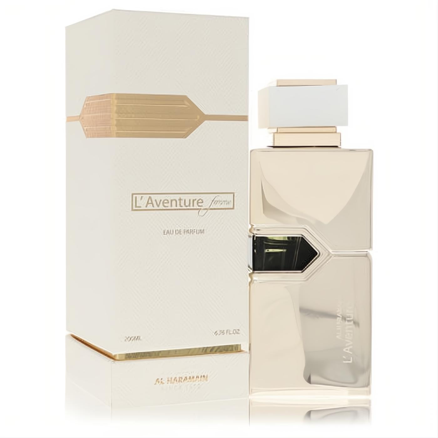 Experience L'aventure Femme 6.7 oz EDP: a luxurious gold metallic bottle with a sleek white cap, presented with its elegant cream and gold box.