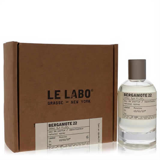 Le Labo Bergamote 22 Eau De Parfum 3.4 oz. Clear glass spray bottle with gray cap, displayed alongside its branded brown box.