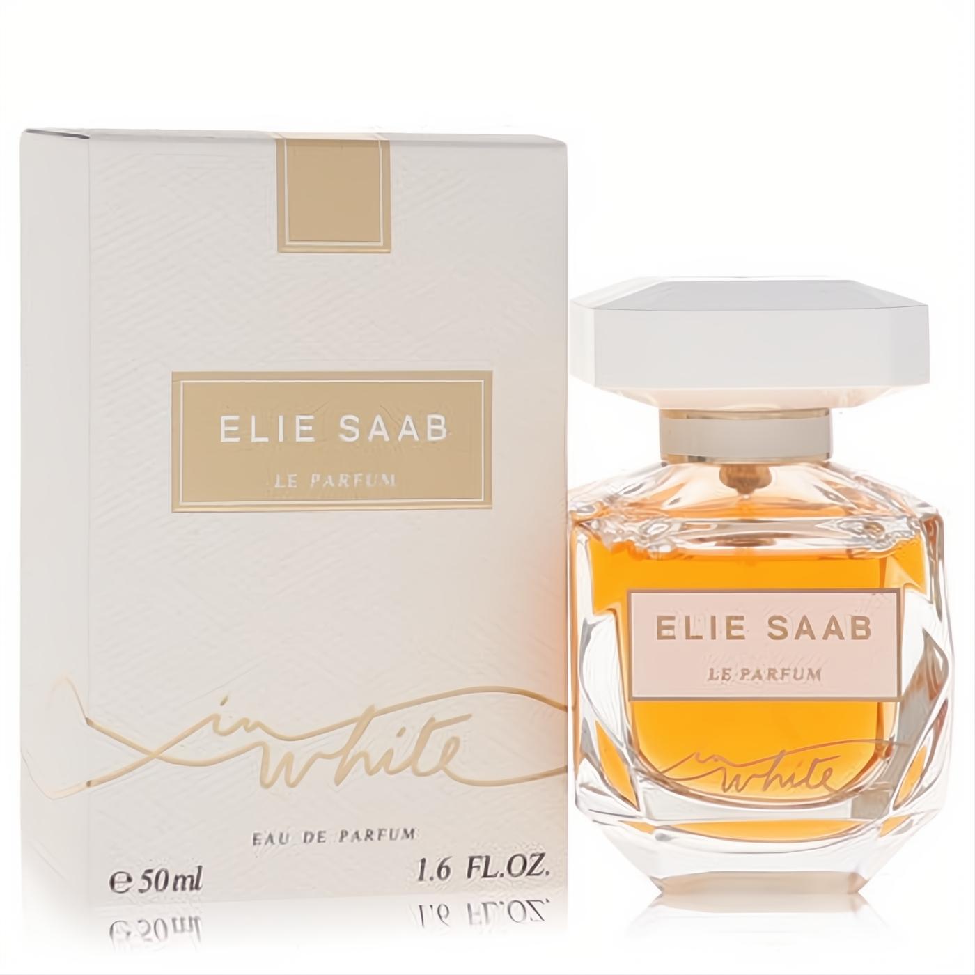 Luxurious Elie Saab Le Parfum In White 1.6 fl.oz. EDP. Amber liquid in a faceted glass bottle with a white cap, next to its elegant white and gold box.