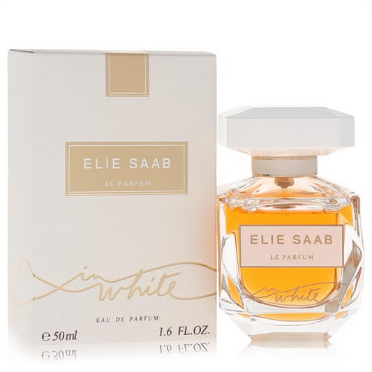 Luxurious Elie Saab Le Parfum In White 1.6 fl.oz. EDP. Amber liquid in a faceted glass bottle with a white cap, next to its elegant white and gold box.