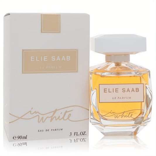 Elie Saab Le Parfum In White 3 oz women's EDP. Elegant faceted glass bottle with amber liquid, white cap, and chic white & gold box.