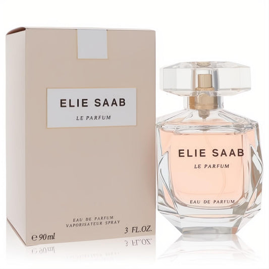 Experience Elie Saab Le Parfum 3 oz Eau De Parfum spray. Elegant faceted glass bottle with delicate peach liquid and matching beige box.
