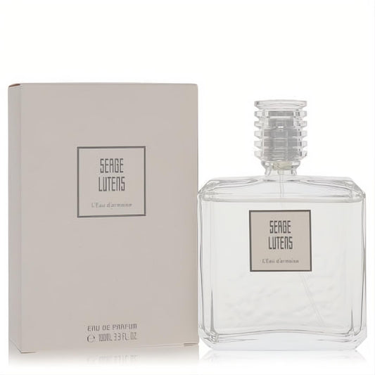 Serge Lutens L'eau D'armoise 3.3 oz unisex EDP spray. Elegant clear glass bottle with ribbed cap and chic light beige box.