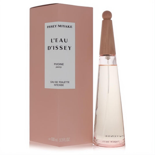 L'eau D'issey Pivoine 3.3 oz EDT Intense. Elegant clear bottle with light pink liquid, unique rose gold cap, and matching pink box.