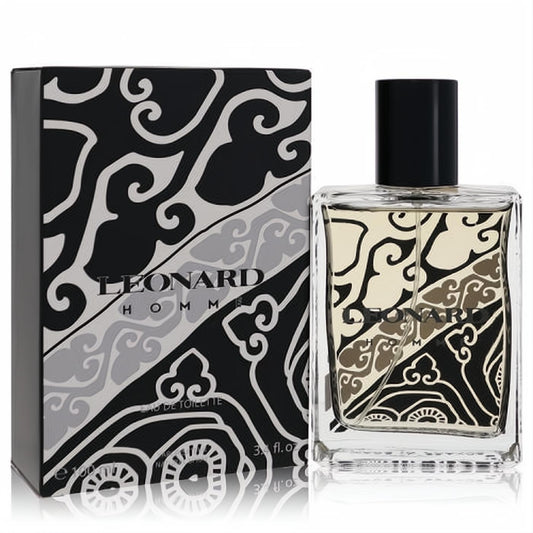 Leonard Homme men's 3.4 oz Eau De Toilette. Clear glass bottle and matching box with a striking black, white, and grey abstract design.
