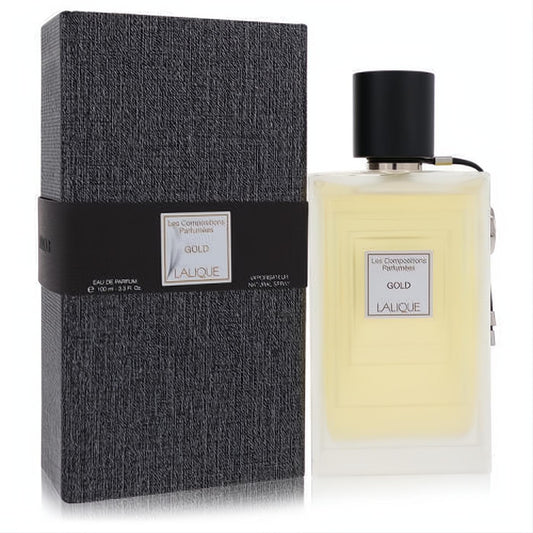 Exquisite Lalique Gold 3.3 oz EDP spray. Clear rectangular bottle with radiant golden fragrance, sleek black cap, and sophisticated textured black box.