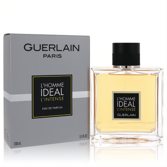 Bold Guerlain L'homme Ideal L'intense 3.3 oz men's Eau de Parfum. Sleek glass bottle with golden liquid, black cap, and elegant gray box.