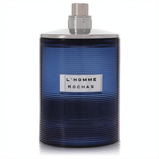 Experience L'homme Rochas. Masculine deep blue ribbed glass bottle with sleek silver cap.