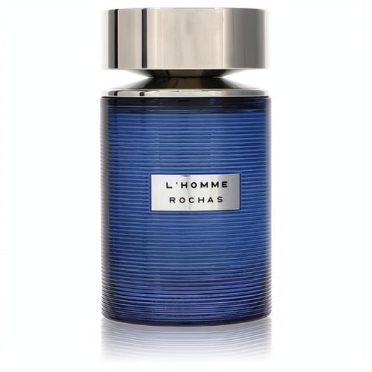 Sophisticated L'Homme Rochas men's cologne in a striking blue ribbed glass bottle with a silver cap.