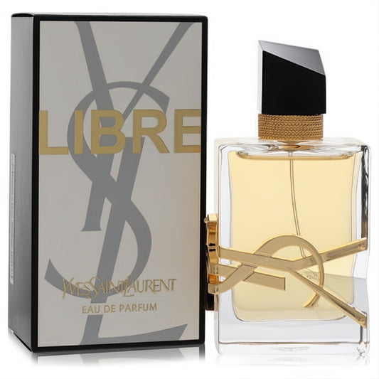 Yves Saint Laurent Libre 1.6 oz EDP: elegant clear glass bottle with golden liquid, iconic gold YSL logo, and sleek black cap.