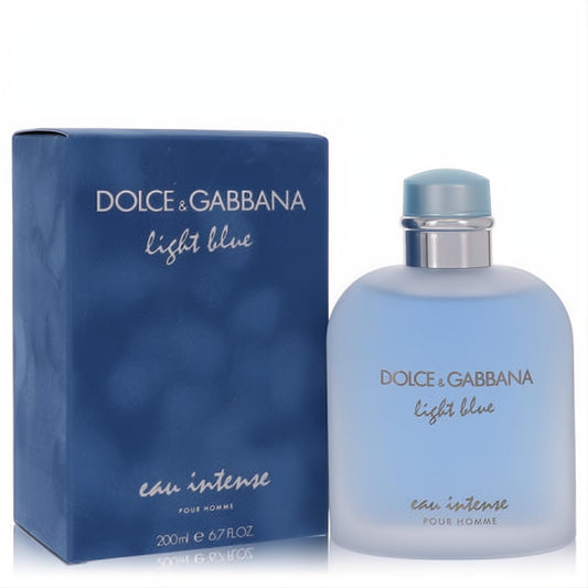 Dolce & Gabbana Light Blue Eau Intense 6.7 oz men's cologne. Sleek frosted light blue bottle with silver accent, beside its matching box.