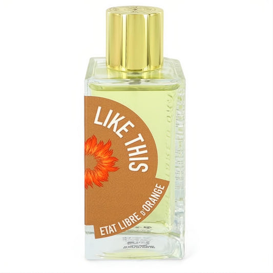 Enticing Like This by Etat Libre D'Orange 3.4 oz women's perfume. Clear bottle, gold cap, warm orange label with flower.