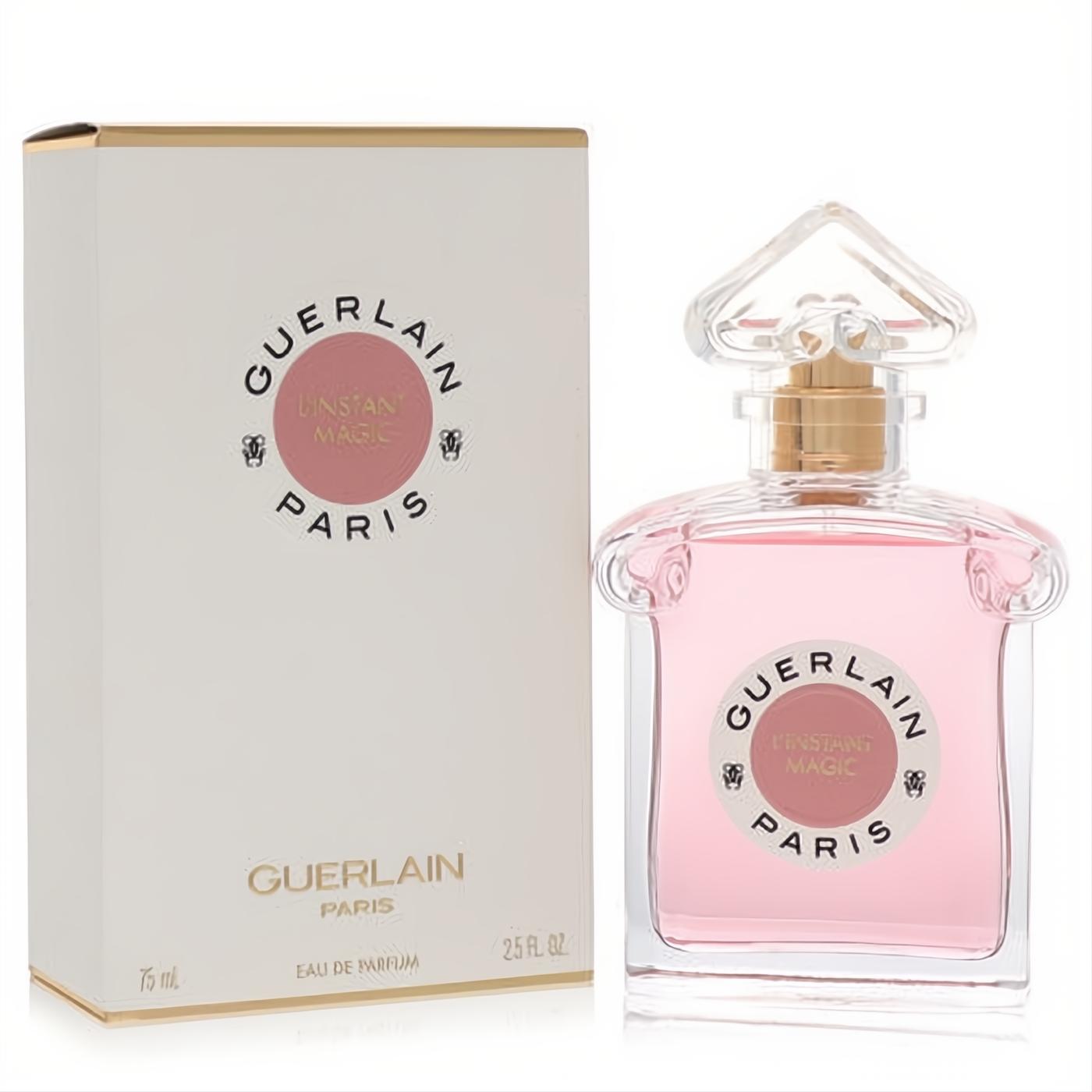 Experience L'instant Magic Guerlain 2.5 oz EDP. Elegant clear bottle, soft pink perfume, gold accents, and chic white box.