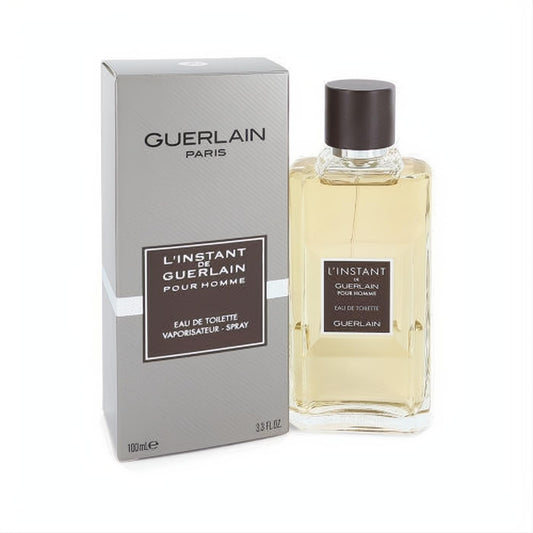 Discover L'instant de Guerlain Pour Homme 3.3 oz EDT spray. Sleek gray box and clear glass bottle with amber liquid.