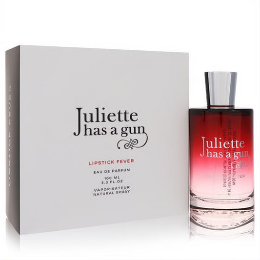 Juliette Has A Gun Lipstick Fever 3.3 oz EDP. Striking red-to-clear glass bottle with silver cap, presented with its chic white box.