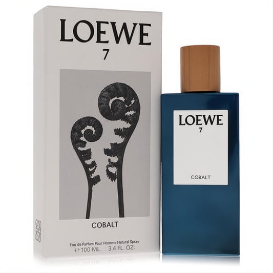 Experience Loewe 7 Cobalt 3.4 oz Eau de Parfum. Sleek cobalt blue bottle, natural wood cap, and elegant white box with fern art.